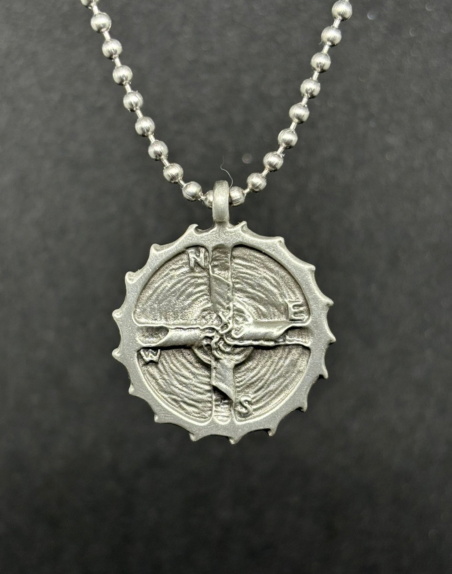 Eye of the Storm Pewter Surf Pendant